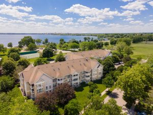 Aerial shot of Olbrich by the Lake apartment building with Lake Monona in the background