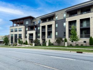 View of the side of Watts Hill apartments from across the street