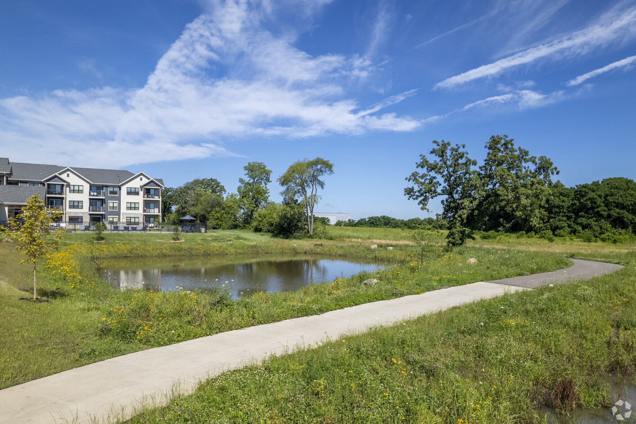 Irish Fields Apartments as seen from a nearby bike path